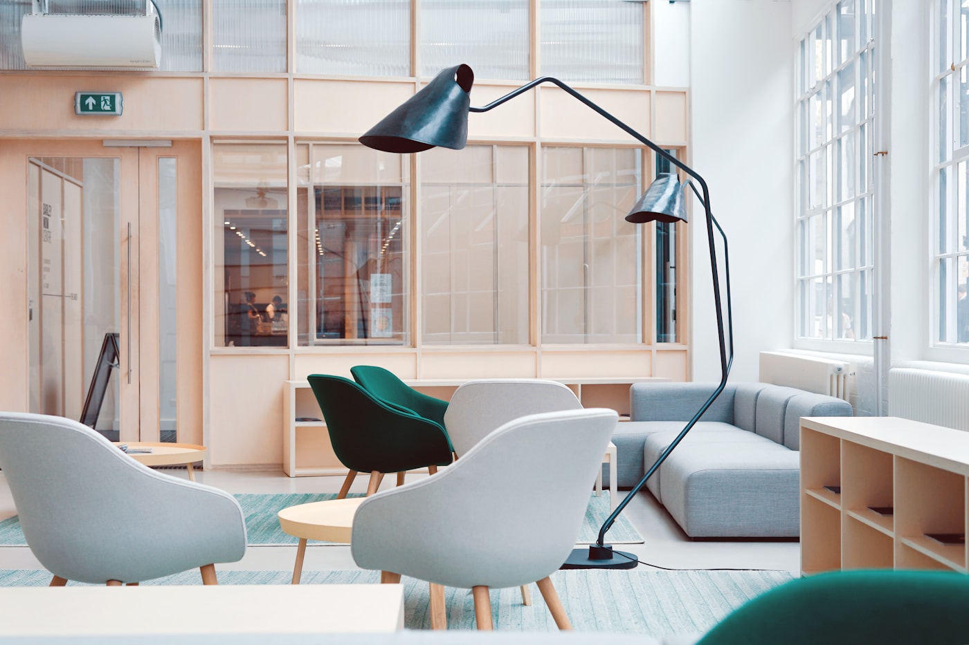 Bright open-plan creative office with large windows